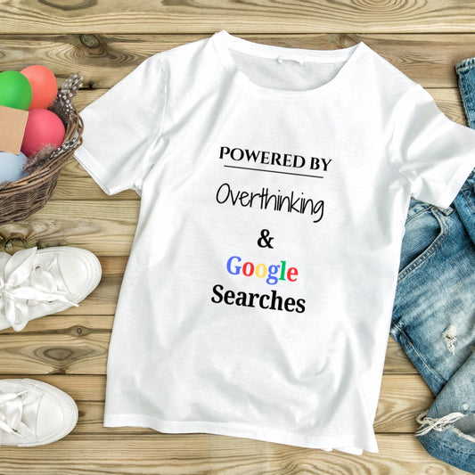 White crew neck t-shirt with the text 'POWERED BY Overthinking & Google Searches' printed on the front.